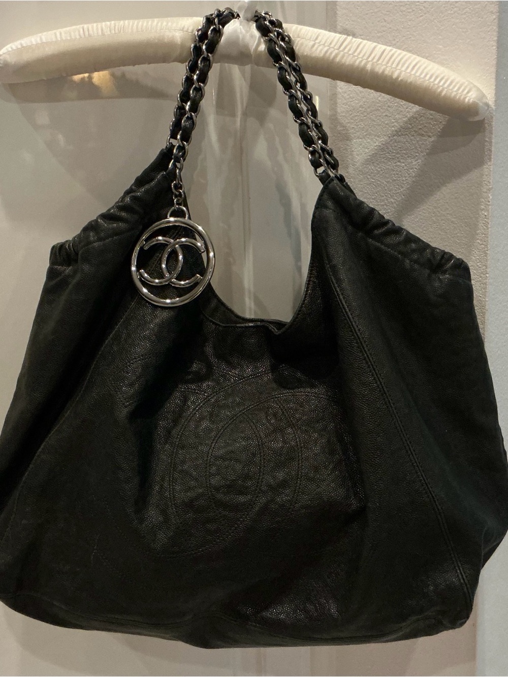 CHANEL Black Leather Hobo with Silver-Tone Chain and CC Charm